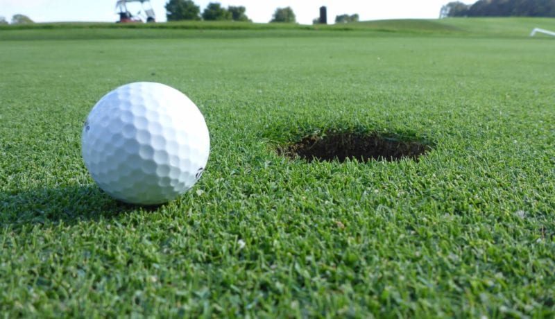 Golf Ball Next to the Hole one Sunday Ultra Dwarf Grass