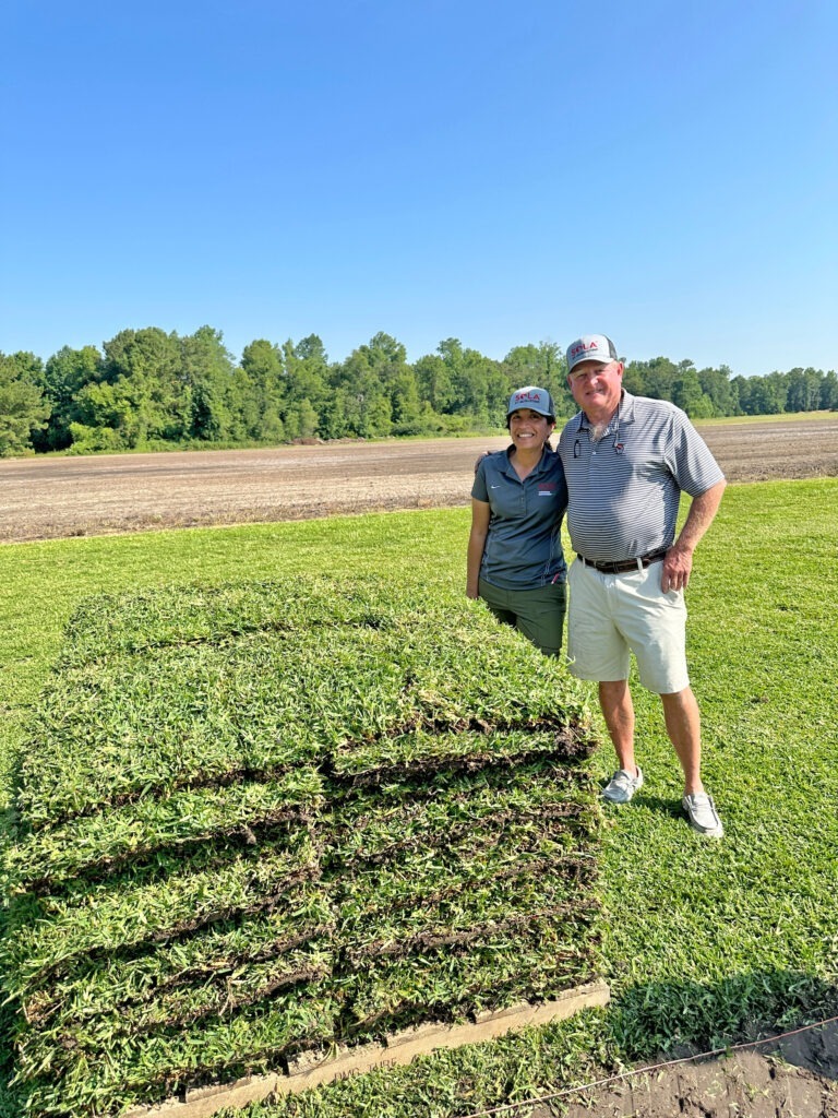 Dr. Susana Milla-Lewis and Rick Neisler at the Sola™ St. Augustinegrass Field Day on June 14.