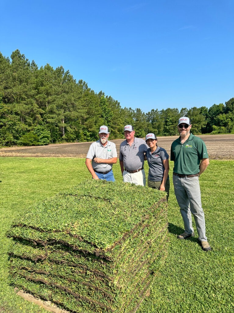 Al Wooten, Rick Neisler. Dr. Susana Milla-Lewis and Will Neisler at the Sola™ St. Augustinegrass Field Day on June 14.