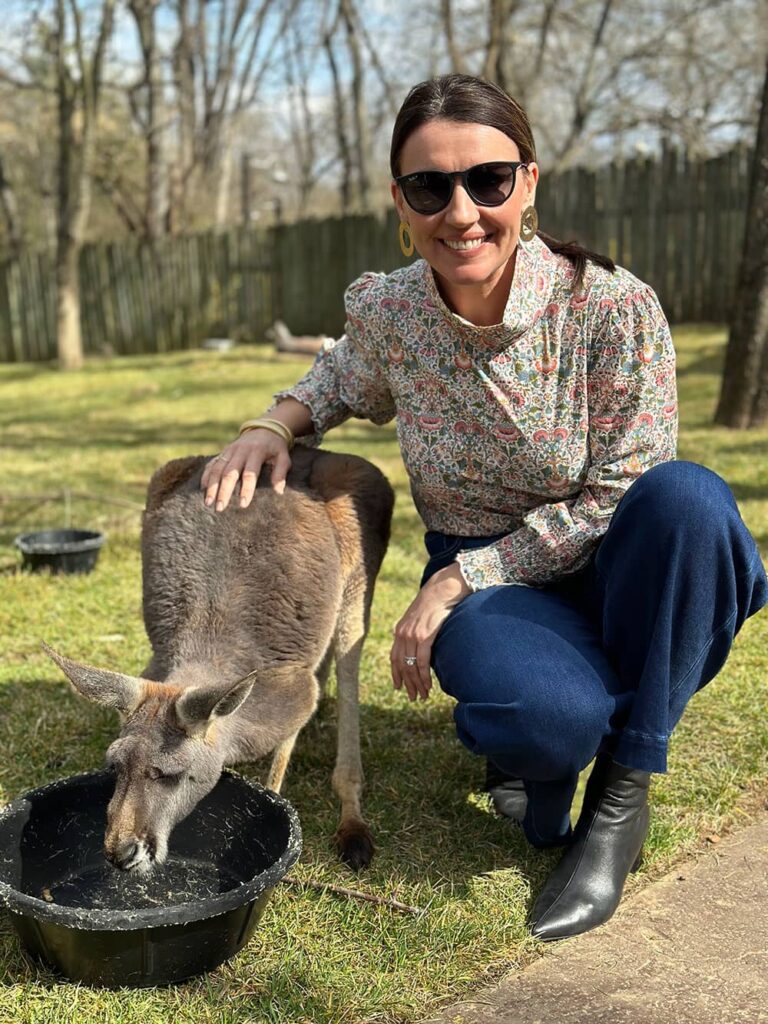 Erin Wilder, the Executive Director of Business and Professional Development of Sod Solutions Professionals, with a kangaroo at the Nashville Zoo in March 2023.